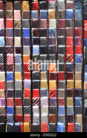 Colorful ties displayed in a fashion shop Stock Photo