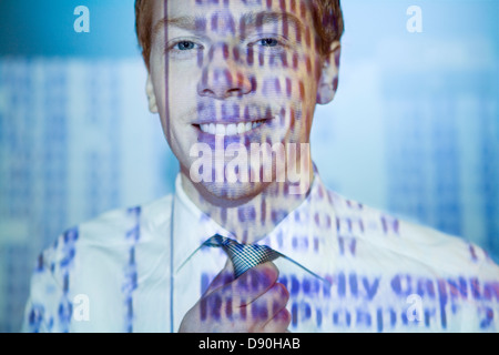 Projection of numbers on a man. Stock Photo