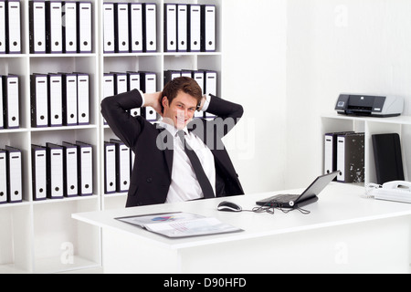 relaxed businessman in office Stock Photo