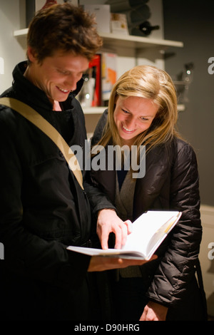Couple reading book Stock Photo