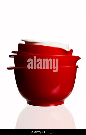 Red and white bowls in stack Stock Photo