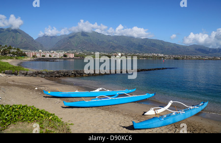 Outrigger canoes beached at Kahului on Maui Stock Photo