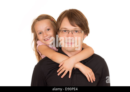 Father giving piggyback ride to his daughter. Isolated on white background. Stock Photo