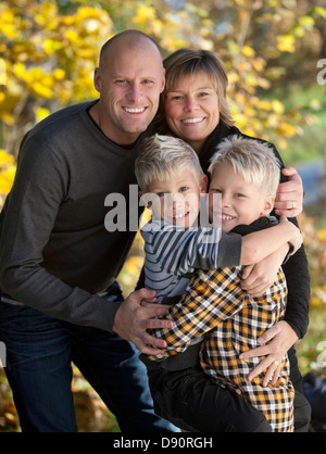 Portrait of family spending time together in park Stock Photo