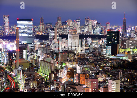 Aerial night view over Ebisu, Tokyo, Japan looking towards the skyscraper district of Shinjuku. Stock Photo