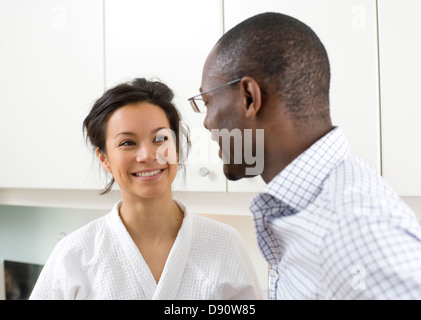 Smiling couple in kitchen Stock Photo