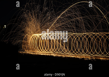 Round circular sparkler with trail of light