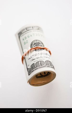 One hundred dollar bill with rubber band Stock Photo