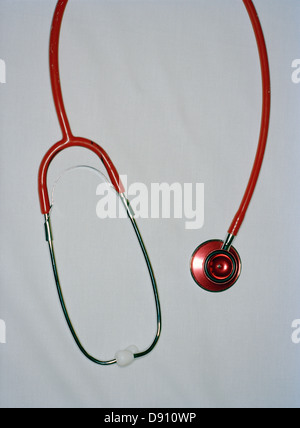 Close -up red stethoscope on white background Stock Photo - Alamy
