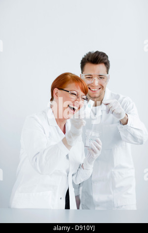 Two scientists working in laboratory Stock Photo