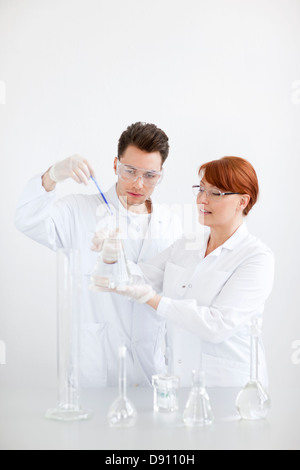 Two scientists working in laboratory Stock Photo
