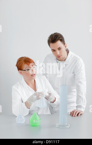 Two scientists working in laboratory Stock Photo