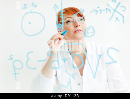 Female scientist working in laboratory Stock Photo