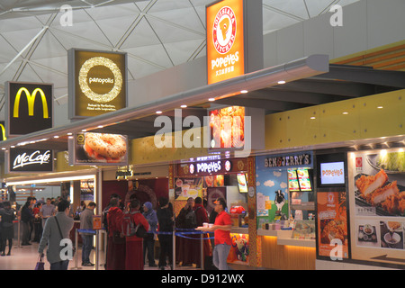 China,Asia,Far East,Orient,Oriental,Hong Kong,International Airport,HKG,terminal,gate,interior inside,food court plaza table tables casual dining,Pope Stock Photo