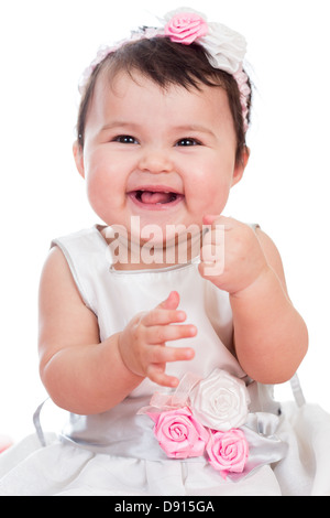 Portrait of smiling baby girl on a white background Stock Photo