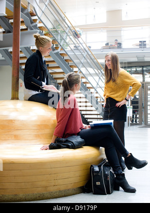 Students on university corridor Stock Photo