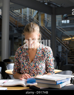 University student sitting in cafe Stock Photo