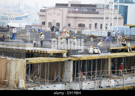 Dubai building industry, construction work being carried out in the city of Dubai, United Arab Emirates Stock Photo