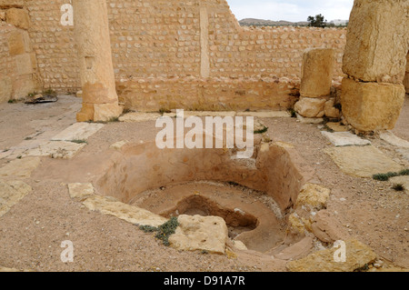 Baptismal Font in the ruins of the roman city of Sbeitla or Sufetla near Kasserine Tunisia Stock Photo