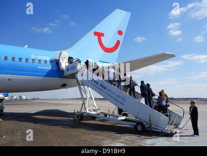 Passengers boarding a Thomson flight, UK Stock Photo