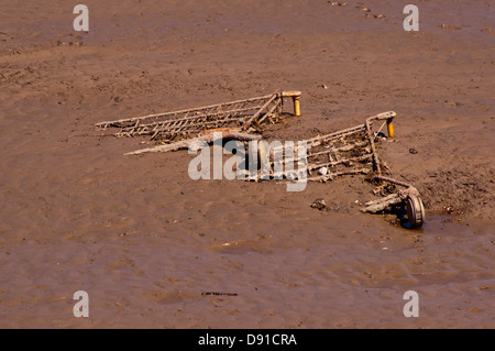 Dumped abandoned shopping trolley Stock Photo