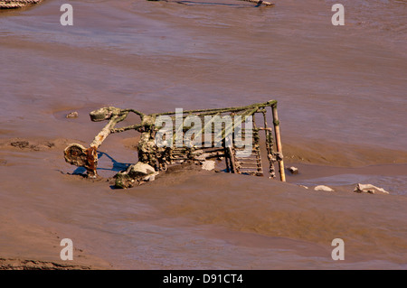 Dumped abandoned shopping trolley Stock Photo