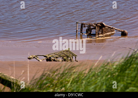 Dumped abandoned shopping trolley Stock Photo