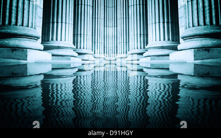 Close up of water reflection of columns installed in a lake in France ...