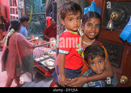 Singapore,Little India,Serangoon Road,Sri Veeramakaliamman Temple,Hindu,bindi,Tamil,Asian girl girls,female kid kids child children,boy boys,male,brot Stock Photo