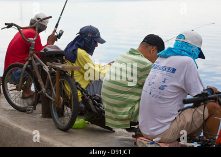 Anglers on Manila Bay, Philippines Stock Photo