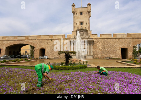 Walls of «Puertas de Tierra» and gardeners, Cadiz, Region of Andalusia, Spain, Europe Stock Photo