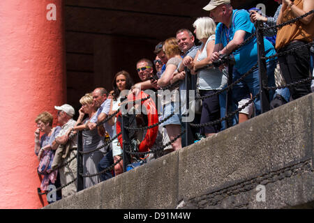 Liverpool, UK 8th June, 2013. Spectators at the Red Bull Harbour Reach 2013, an inaugural event where Ships, a Shanty Festival, Regattas, wakeboarding and historic canal boats are all taking part in a Mersey River Festival at Albert Dock.   Credit:  Cernan Elias/Alamy Live News Stock Photo