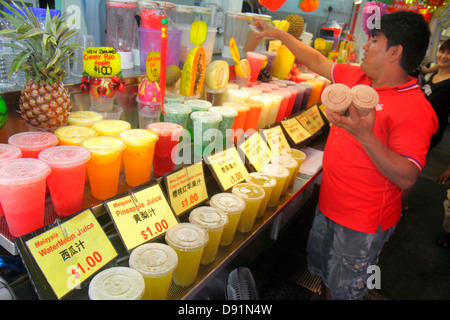 Singapore,Bugis Street,shopping shopper shoppers shop shops market markets marketplace buying selling,retail store stores business businesses,fruit dr Stock Photo