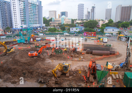 Singapore Jalan Besar,Rochor MRT Station,subway train,under new construction site building builder,city skyline,skyscrapers,aerial overhead view from Stock Photo