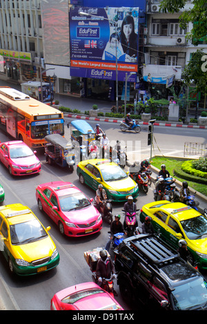 Bangkok Thailand,Thai,Pathum Wan,Rama 1 Road,traffic,taxi taxis,cab,cabs,motorcycles,motor scooters,bus,coach,auto rickshaw,tuk-tuk,sam-lor,Skywalk,vi Stock Photo