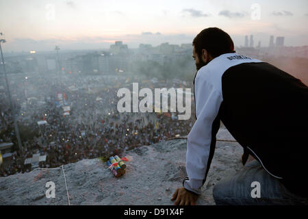 Protesters at the roof of the Ataturk Cultural Center occupied during ...