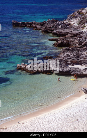 Mother and daughter about to set off for a snorkel in Little Armstrong Bay, Rottnest Island, Western Australia. No MR Stock Photo