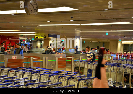 Passport immigration counters: Singapore Changi airport Stock Photo