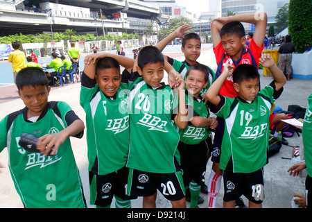 Bangkok Thailand,Thai,Pathum Wan,Rama 1 Road,National Stadium,soccer footbal futbol,Asian boy boys male kids children student students team,teammates, Stock Photo