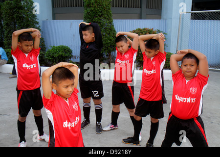 Bangkok Thailand,Thai,Pathum Wan,Rama 1 Road,National Stadium,soccer football futbol,Asian Asians ethnic immigrant immigrants minority,boy boys lad la Stock Photo