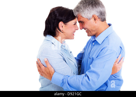 happy middle aged couple hugging each other isolated on white background Stock Photo