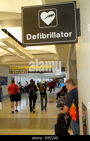 Texas,South,Southwest,Houston,George Bush Intercontinental Airport,IAH,gate,sign,defibrillator,heart attack,TX130129035 Stock Photo