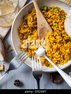 a pan with spanish rice paella style with forks Stock Photo