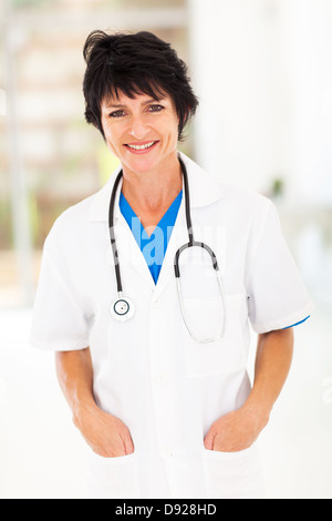pretty female middle aged medical doctor portrait in office Stock Photo