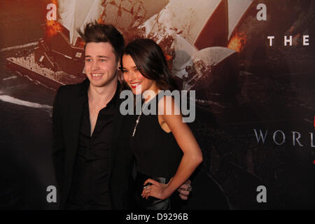 The Star Event Centre, Pirrama Road, Pyrmont, Sydney, NSW, Australia. 9 June 2013. Stars walked the red carpet at Star Casino in Sydney for the Australian Premiere of World War Z. Pictured is Singer Reece Mastin and Actress Rhiannon Fish. Credit: Credit:  Richard Milnes / Alamy Live News. Stock Photo