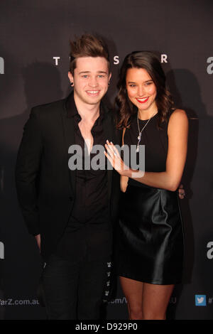 The Star Event Centre, Pirrama Road, Pyrmont, Sydney, NSW, Australia. 9 June 2013. Stars walked the red carpet at Star Casino in Sydney for the Australian Premiere of World War Z. Pictured is Singer Reece Mastin and Actress Rhiannon Fish. Credit: Credit:  Richard Milnes / Alamy Live News. Stock Photo