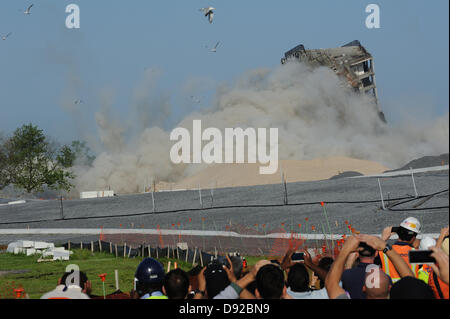 Governors Island, NY, US. 9 June 2013. Using more than 200 pounds of dynamite, an 11-story building was imploded on Governors Island at 7:36 a.m. on June 9, 2013. It took approximately 10 seconds for the building to be reduced to a pile of rubble. Credit:  Terese Loeb Kreuzer/Alamy Live News Stock Photo