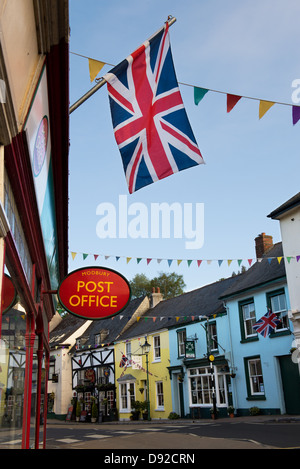 Post Office and Union Jack. Modbury high Street. Devon, England Stock Photo