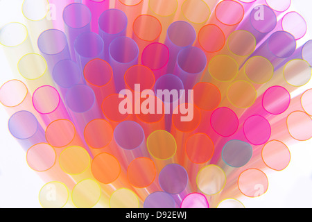 Macro view of multi-colored straws on white background Stock Photo