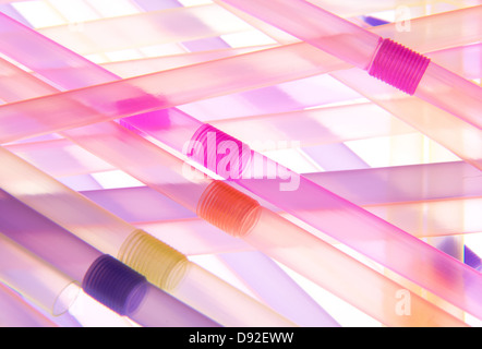 Macro view of multi-colored straws on white background Stock Photo
